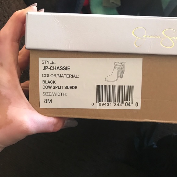 Black ankle boots. Jessica Simpson - Picture 2 of 4